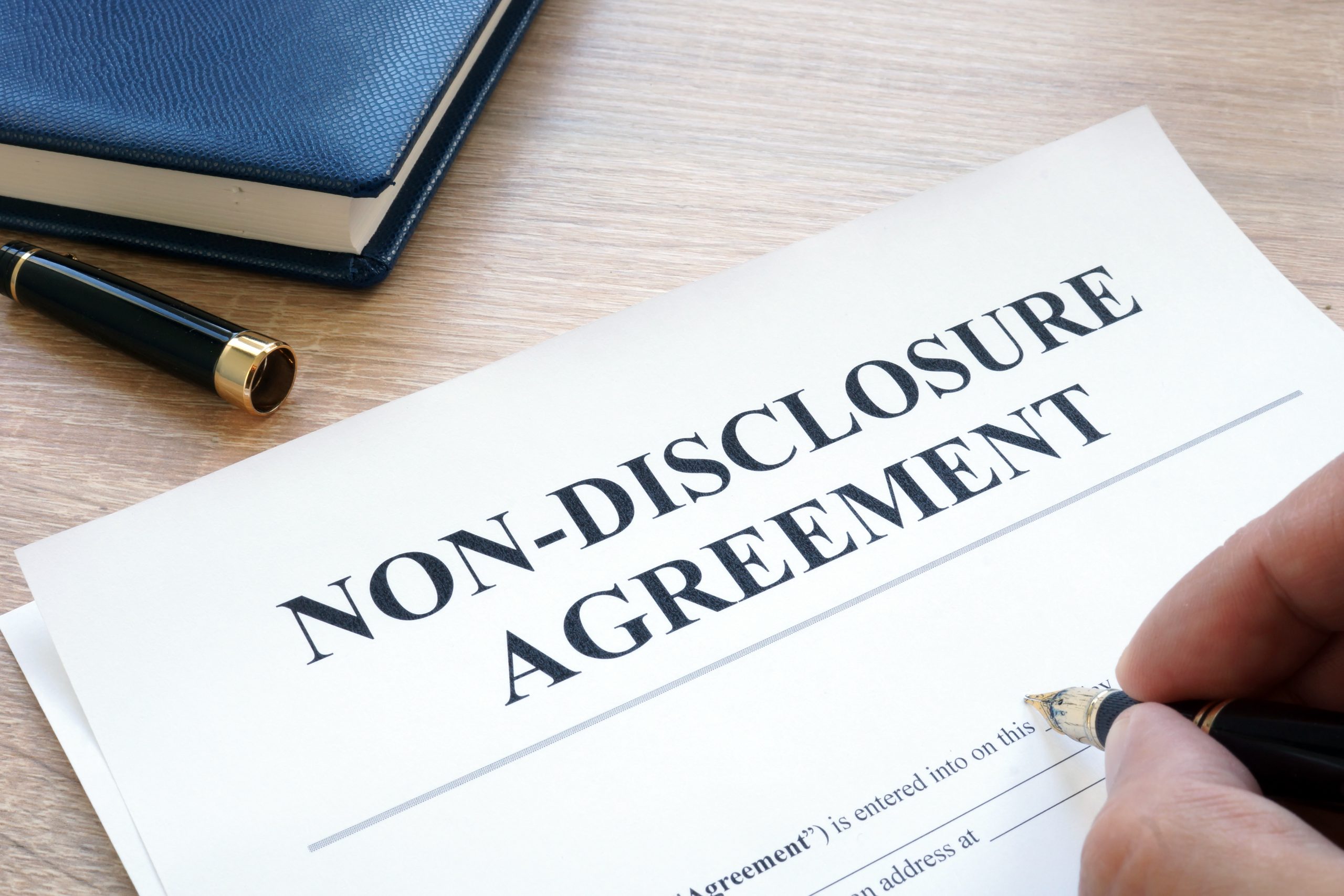 Man Is Filling In Non Disclosure Agreement Nda